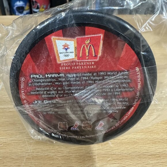 2002 Paul Kariya Joe Sakic McDonald's Salt Lake Olympics Team Canada Hockey Puck - Picture 2 of 2